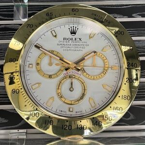 DAYTONA Cosmograph Wall Clock Yellow gold bezel insert and white cream face dial